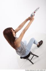 MOLLY SITTING POSE WITH GUN